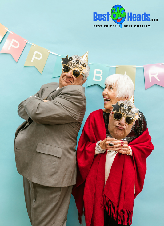 A happy couple enjoying themselves while taking photos and holding personalized Best BIG Head™ cutouts of their own faces, adding fun to the celebration.