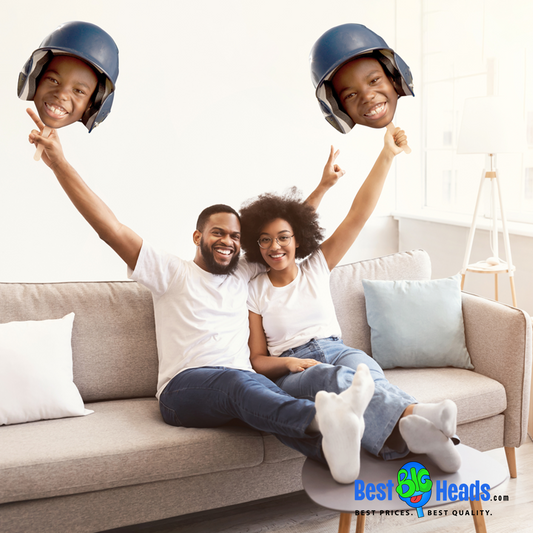 Couple together, smiling as they prepare for their son's game, holding team gear and a large face cutout of their son, ready to cheer from the sidelines.