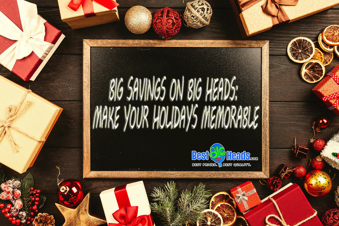 A holiday-themed chalkboard with the text "Big Savings on Big Heads: Make Your Holidays Memorable," surrounded by festive decorations, wrapped gifts, dried orange slices, and ornaments. The Best BIG Heads™ logo is featured on the chalkboard.