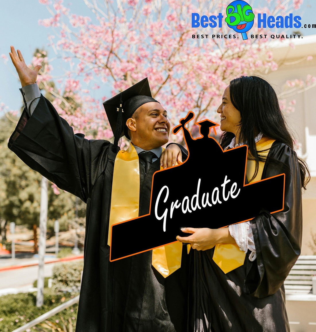 Two excited graduates in caps and gowns celebrate outdoors, holding a custom "Graduate" sign with a cap and diploma silhouette.